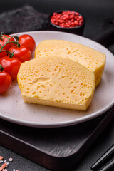 Delicious omelet with milk, spices and herbs cut into large pieces