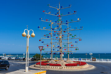 Walking on sea promenade in Benalmadena, Spain on May 7, 2023