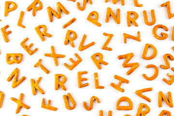 On a white background cookies in the form of letters.