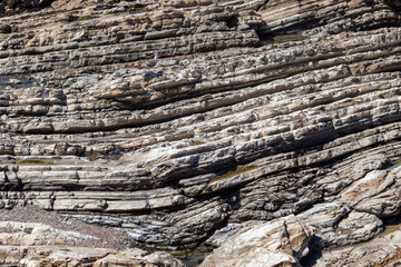 pattern of stones at the coast in different layers