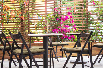 Cafe with a wooden chair with flowers