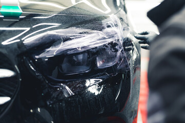 Professional car detailing center - making cars shiny and well maintained. High quality photo