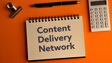 There is notebook with the word Content Delivery Network.It is as an eye-catching image.