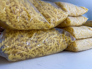 Fusilli noodles in large packages on the shelf