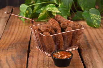 Fried and breaded codfish cake, fish empanadas, codfish cake, Brazilian-style codfish cakes, meat disc