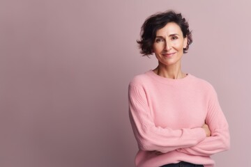 Medium shot portrait photography of a satisfied woman in her 40s wearing a cozy sweater against a pastel or soft colors background. Generative AI