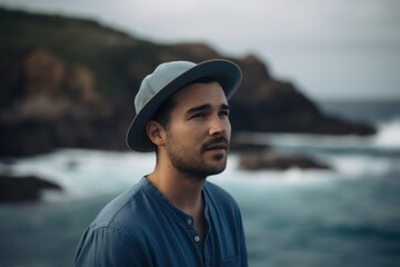 Full-length portrait photography of a satisfied man in his 20s wearing a cool cap or hat against a water or ocean background. Generative AI - obrazy, fototapety, plakaty