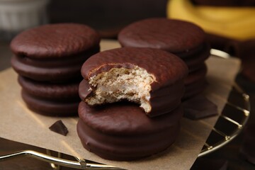Delicious banana choco pies on table, closeup