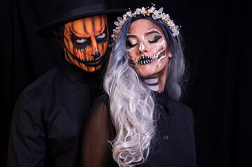 Couple wearing day of the dead costume 