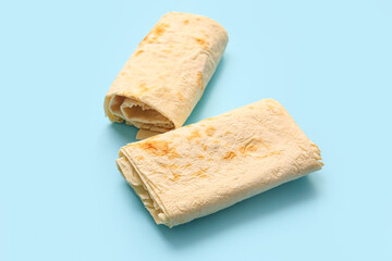 Fresh thin lavash on blue background