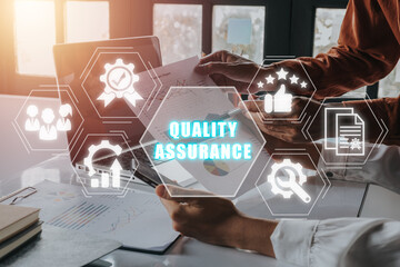 Quality Assurance concept, Business team working on laptop computer and analyzing finance data on...