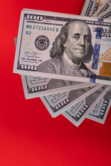 Obraz na płótnie Canvas Bundles of 100 American dollars bills