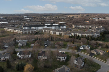Obraz premium Single Family Houses and Apartment Block