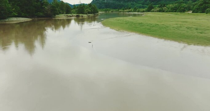 Low aerial over small estuary rivers