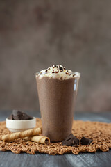 Coffee and cream frappe. With coffee beans and concept presentation.