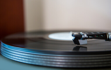 Close-up vintage vinyl record player. Retro audio equipment turntable.