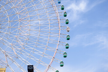 ferris wheel on a blue sky