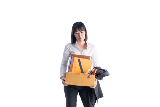 Working woman wearing a suit is holding a toolbox. Fired