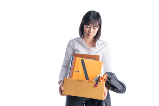 Working woman wearing a suit is holding a toolbox. Fired