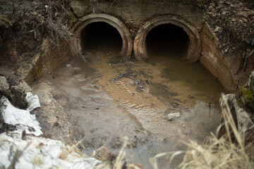 Pipes in ground. Draining water. Industrial waste.