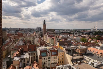 Deurstickers View from above, aerial Wroclaw central market square with old houses. Historical capital of Silesia, Europe. City hall architecture buildings. Old town landmark cathedrals church. Travel tourist © anna.stasiia
