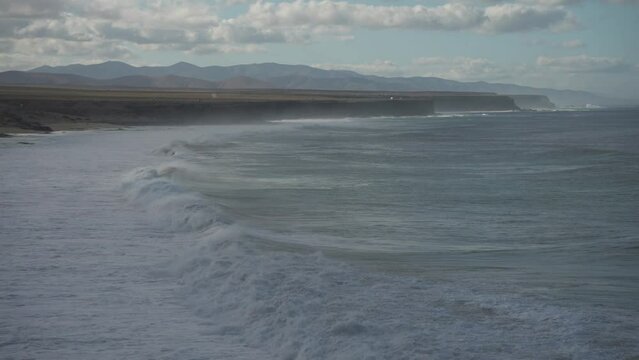 Waves and spectacular rocky coastline from El Cotillo, El Cotillo