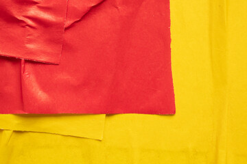 Blank red and yellow crumpled and creased paper poster texture background