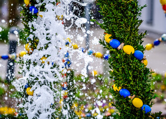 typical bavarian easter decoration at a well