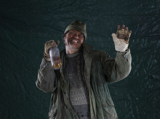 drunk homeless man on dirty background