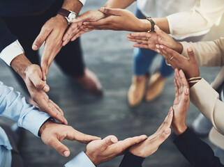Collaboration, diversity and business people with their hands together in a circle for unity....