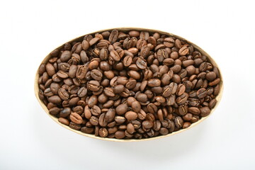 Roasted organic Cocoa Beans on white Background Stock Photo, Picture. top view. 