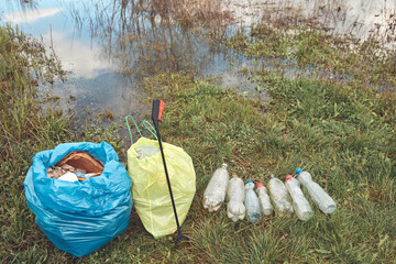 Collected trash thrown away in nature.