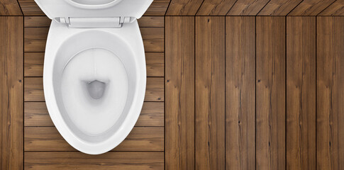 Top view. of toilet bowl in bathroom with wooden floor