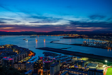 Sunset over Gibraltar town and the Bay of Gibraltar, UK