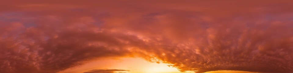 Sunset sky panorama with dramatic bright glowing pink Cumulus clouds. HDR 360 seamless spherical panorama. Full zenith or sky dome for 3D visualization, sky replacement for aerial drone panoramas.