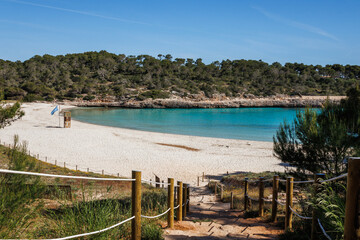 Cala S'Amarador beach with white sand and turquoise sea in Cala Mondrago bay at Mallorca, Balearic islands, Spain
