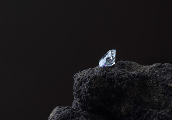 Close up of polished diamond on the rock. High quality photo