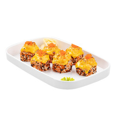 Isolated portion of sushi rolls with cheddar cheese and caviar