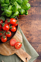 fresh tomatoes on a wooden table