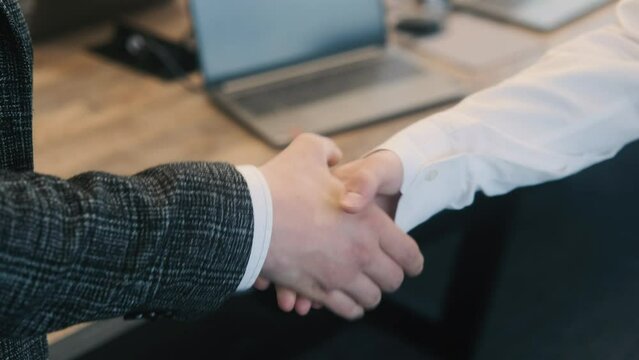 businessmen, handshake in the office