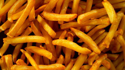 Freeze Motion Shot of Flying Fresh French Fries, Close-up