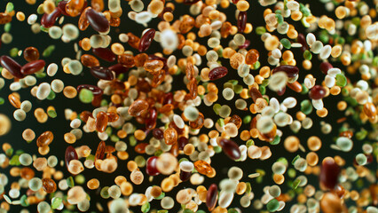 Freeze motion of rotating mix legumes pieces in the air