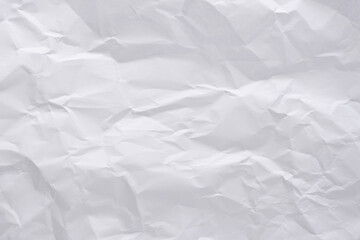 White crumpled paper texture background, clean white wrinkled paper, top view.