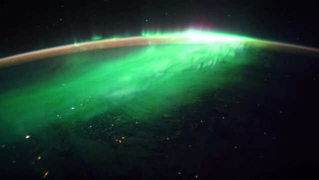 Aurora over planet Earth seen from space. View from International Space Station. Public Domain images from Nasa	