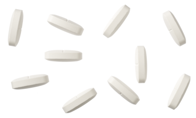 White tablets with half line, isolated on white background, top view.