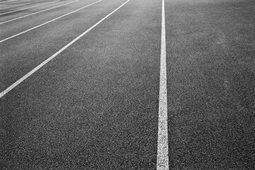 Fototapeta premium grey running track with white lines