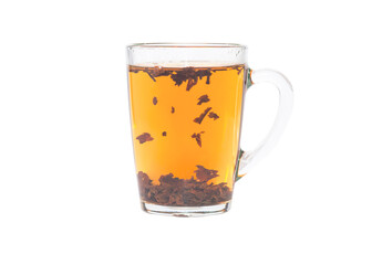 Brewing black tea in a transparent cup. Isolated on a white background.
