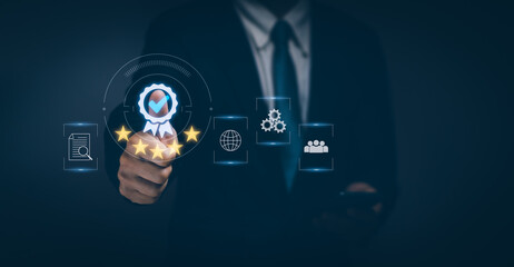 Businessman thumbs up Shows the Quality Assurance (QA) or Standardization (ISO) icon,Concept Certification and Quality Control (QC) Confidence in a business product or service