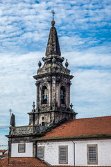Fototapeta na wymiar Tower of Trinity Church in Santo Ildefonso area of Porto city, Portugal