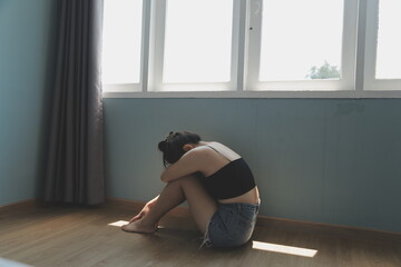 Fototapeta premium panic attacks alone young girl sad fear stressful depressed emotional.crying use hand cover face begging help.stop abusing domestic violence in women,person with health anxiety,people bad feeling down